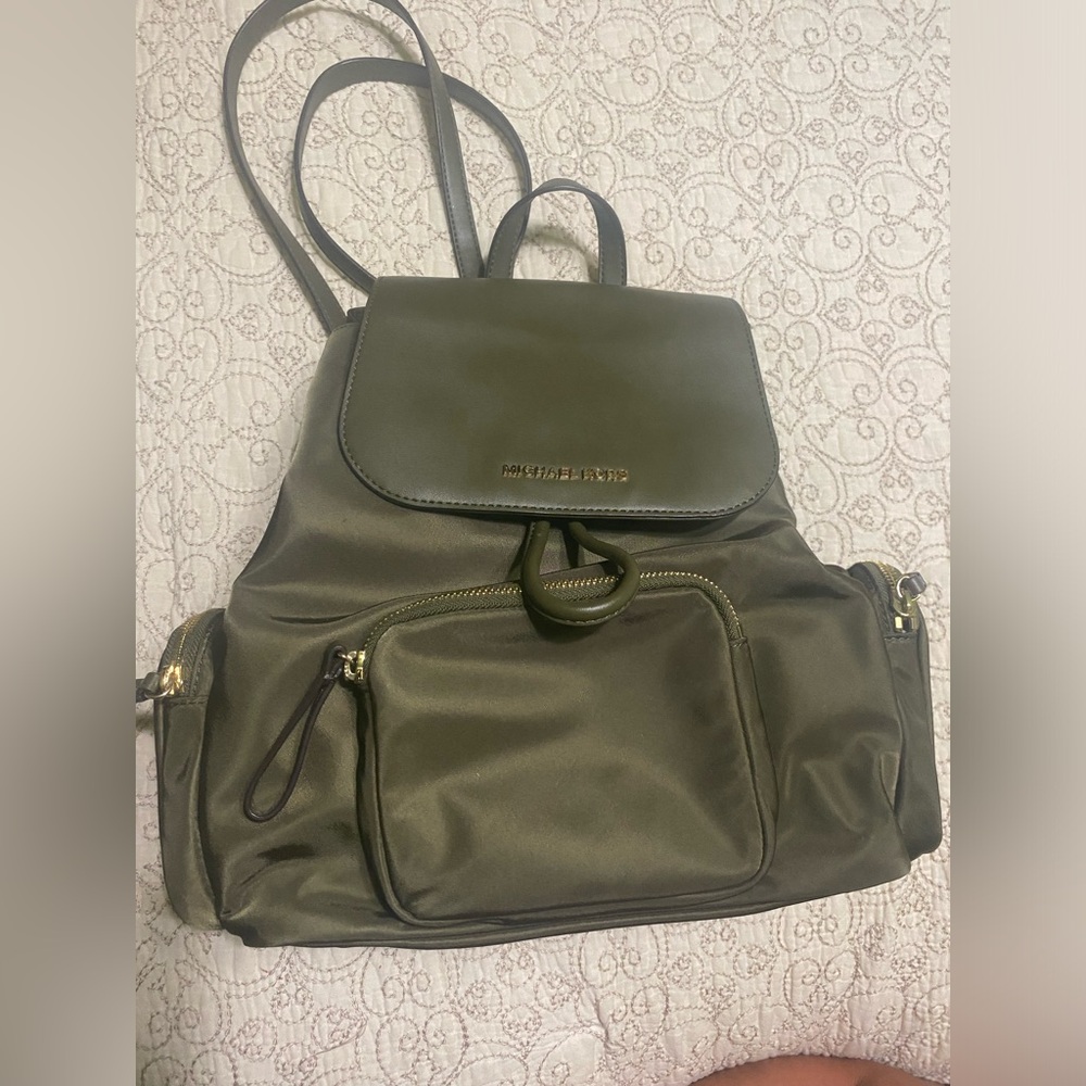 Michael Kors  olive green backpack,  Excellent New condition.